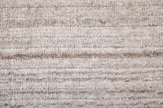 8' X 10' Ivory And Tan Hand Woven Distressed Area Rug