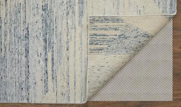 8' X 12' Ivory Blue And Silver Abstract Hand Knotted Distressed Area Rug