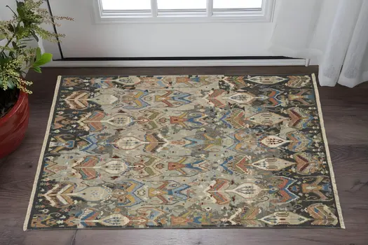9' X 13' Taupe Tan And Orange Ikat Hand Knotted Area Rug With Fringe