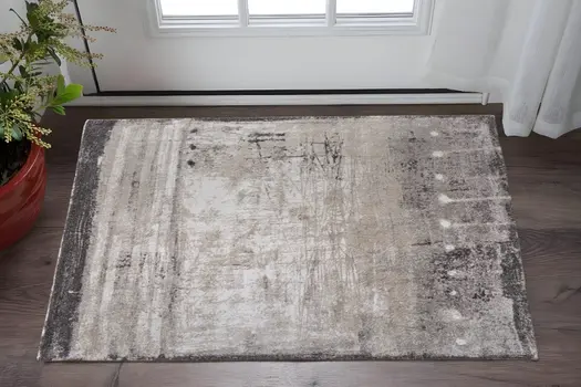 2' X 3' Gray Ivory And Taupe Abstract Distressed Area Rug