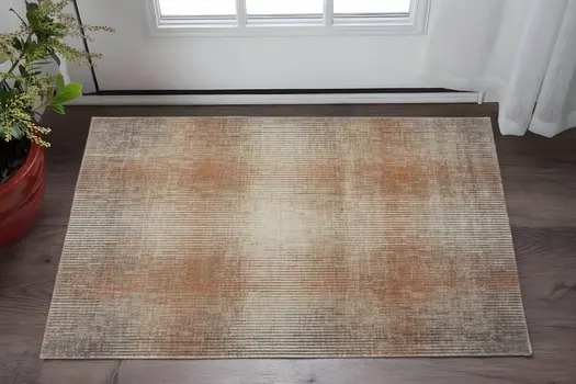 2' X 3' Ivory Taupe And Pink Abstract Area Rug
