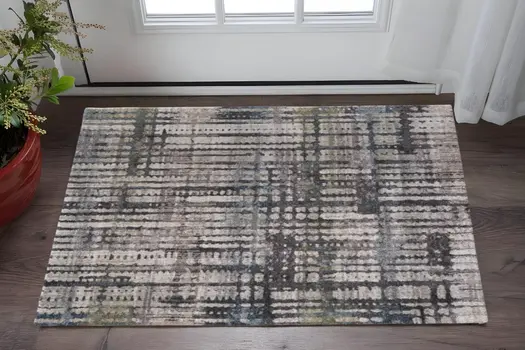 2' X 3' Gray Black And Ivory Abstract Distressed Area Rug