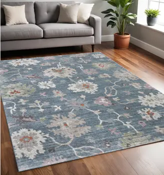 5' X 8' Blue Ivory And Pink Abstract Distressed Area Rug