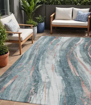 5' X 8' Teal Blue Salmon And Ivory Abstract Washable Indoor Outdoor Area Rug