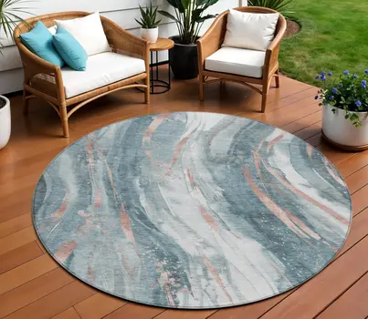 8' Teal Blue Salmon And Ivory Round Abstract Washable Indoor Outdoor Area Rug