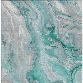 10' X 14' Teal Blue And Ivory Abstract Washable Indoor Outdoor Area Rug