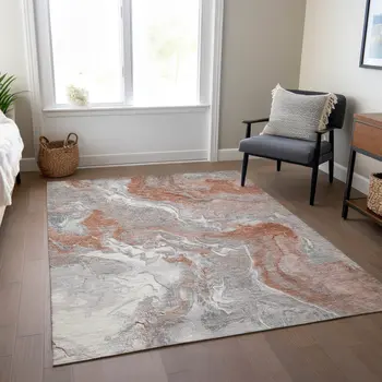 10' X 14' Salmon And Gray Abstract Washable Indoor Outdoor Area Rug