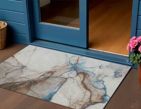 3' X 5' Beige And Blue Abstract Washable Indoor Outdoor Area Rug