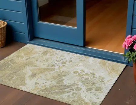 3' X 5' Gold And Ivory Abstract Washable Indoor Outdoor Area Rug