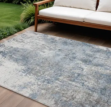 10' X 14' Blue And Ivory Abstract Washable Indoor Outdoor Area Rug