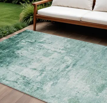 8' X 10' Aqua And Ivory Abstract Washable Indoor Outdoor Area Rug
