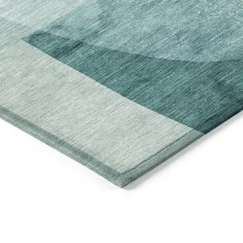 5' X 8' Teal Blue And Ivory Abstract Washable Indoor Outdoor Area Rug