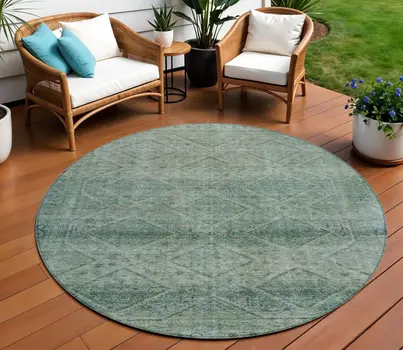 8' Teal Blue And Ivory Round Geometric Washable Indoor Outdoor Area Rug