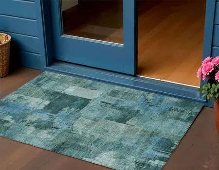 3' X 5' Teal Blue And Pale Aqua Abstract Washable Indoor Outdoor Area Rug