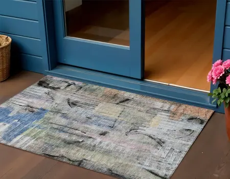 3' X 5' Blue Black And Copper Abstract Washable Indoor Outdoor Area Rug