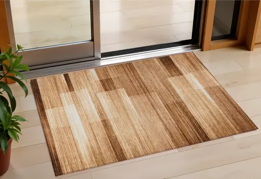 3' X 5' Rust And Ivory Striped Washable Indoor Outdoor Area Rug
