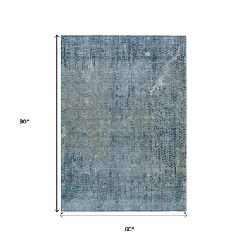 5' X 8' Blue And Ivory Abstract Washable Indoor Outdoor Area Rug