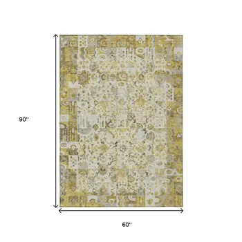 5' X 8' Gold And Ivory Patchwork Washable Indoor Outdoor Area Rug