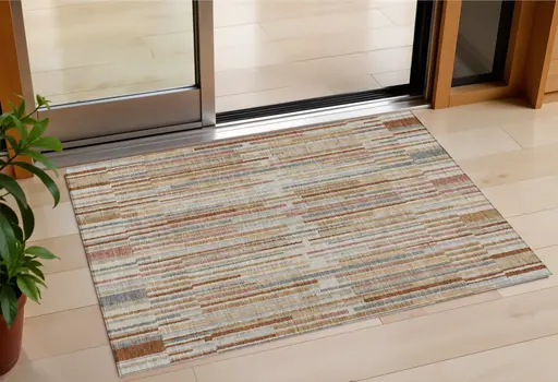 3' X 5' Rust And Ivory Striped Washable Indoor Outdoor Area Rug