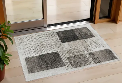 3' X 5' Ivory And Black Geometric Washable Indoor Outdoor Area Rug