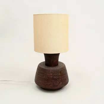 27" Distressed Brown Solid Wood Urn Table Lamp With Beige Drum Shade