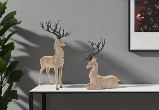 Set of Two Brown And Black Polyresin Deer Figurine