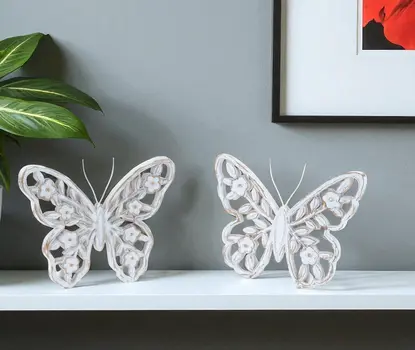 Set of Two White And Beige Polyresin Tabletop Sculpture