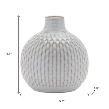 Set of Four Natural And Off White Ceramic Bud Vases With Sculptural Details