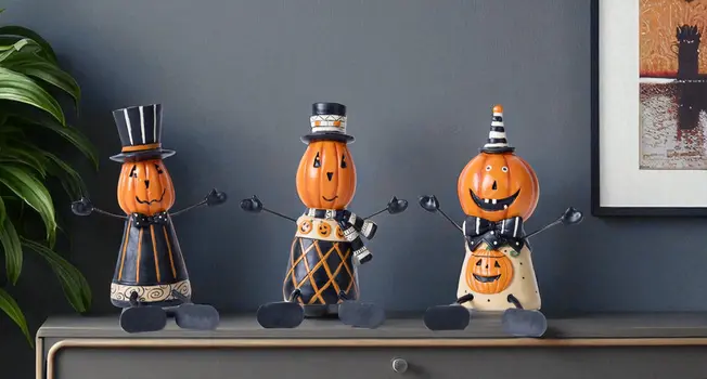 Set of Three Orange And Black Polyresin Tabletop Sculpture