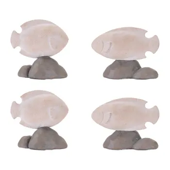 Set of Four Beige And Gray Polyresin Fish Tabletop Sculpture