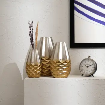 Set of Three Gold Aluminum Urn Table Vases