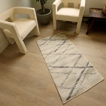 2' X 5' Beige And Gray Abstract Area Rug