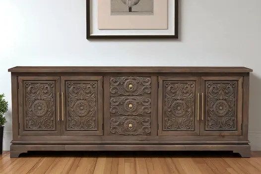 106" Brown Distressed Solid Wood Carved Floral Three Drawer Sideboard with Four Doors