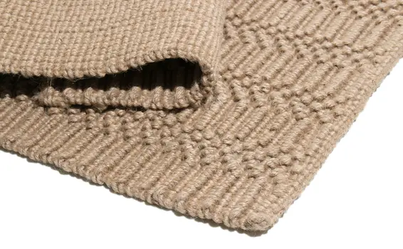 5' X 7' Beige And Brown Jute Abstract Hand Woven Area Rug