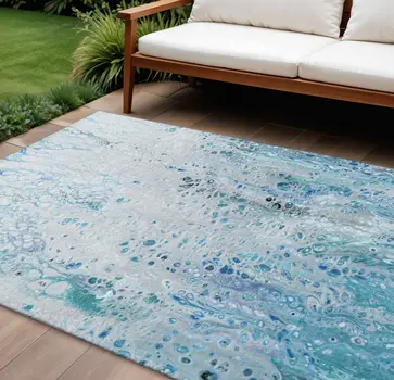 9' X 12' Light Blue And Ivory Abstract Washable Indoor Outdoor Area Rug