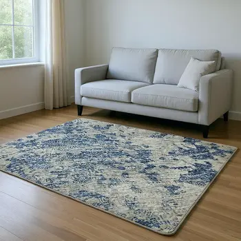 5' X 8' Blue And Ivory Abstract Washable Area Rug With UV Protection