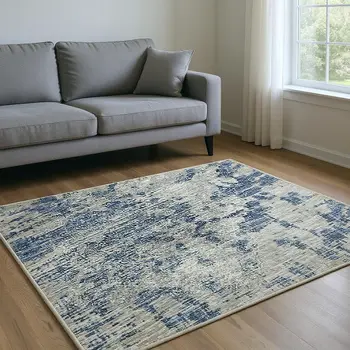 8' X 10' Blue And Ivory Abstract Washable Area Rug With UV Protection