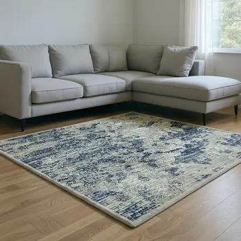 9' X 12' Blue And Ivory Abstract Washable Area Rug With UV Protection
