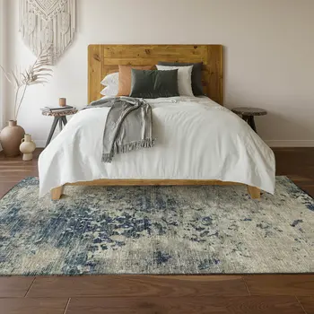 10' X 14' Blue And Ivory Abstract Washable Area Rug With UV Protection