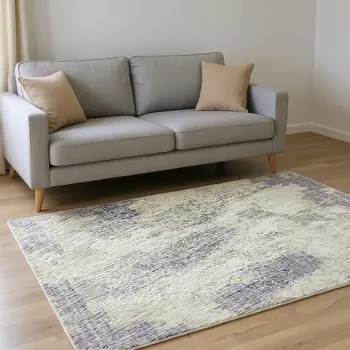 5' X 8' Purple And Ivory Abstract Washable Area Rug With UV Protection