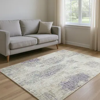 8' X 10' Purple And Ivory Abstract Washable Area Rug With UV Protection