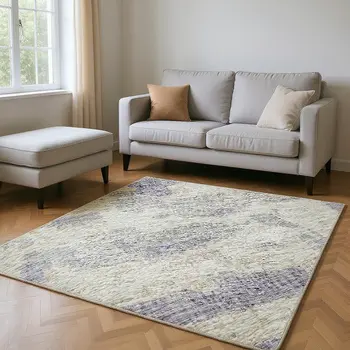 10' X 14' Purple And Ivory Abstract Washable Area Rug With UV Protection