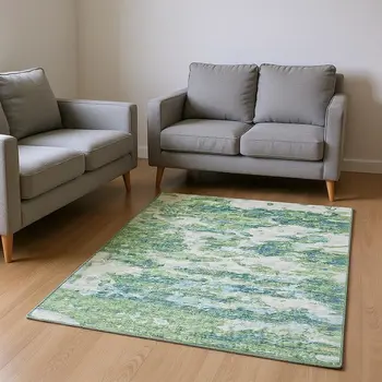 10' X 14' Green And Ivory Abstract Washable Area Rug With UV Protection