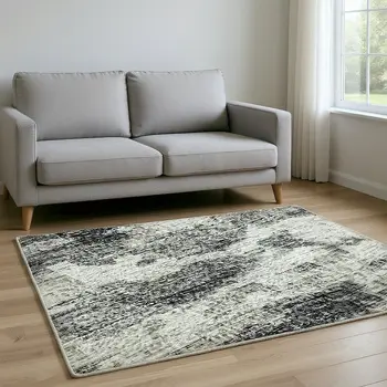 8' X 10' Black And Ivory Abstract Washable Area Rug With UV Protection