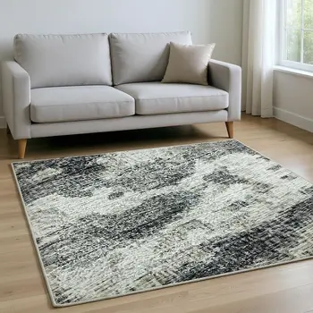 9' X 12' Black And Ivory Abstract Washable Area Rug With UV Protection