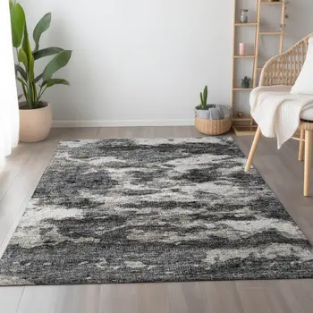 10' X 14' Black And Ivory Abstract Washable Area Rug With UV Protection
