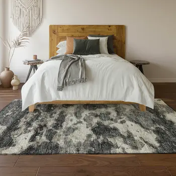 10' X 14' Black And Ivory Abstract Washable Area Rug With UV Protection