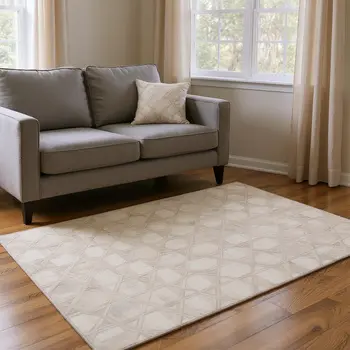 5' X 8' Ivory And Beige Geometric Washable Area Rug With UV Protection