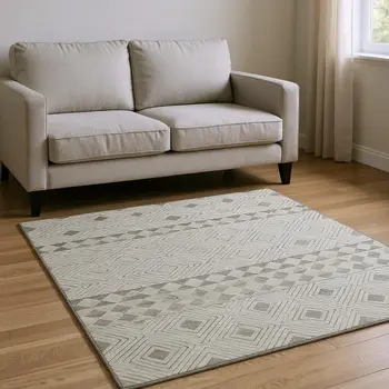 5' X 8' Taupe And Ivory Geometric Washable Area Rug With UV Protection