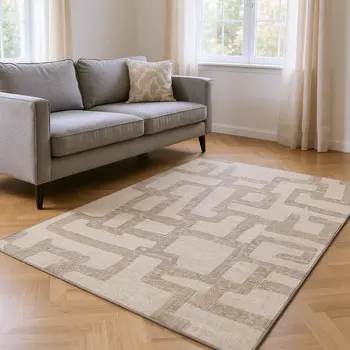 9' X 12' Tan And Ivory Abstract Washable Area Rug With UV Protection